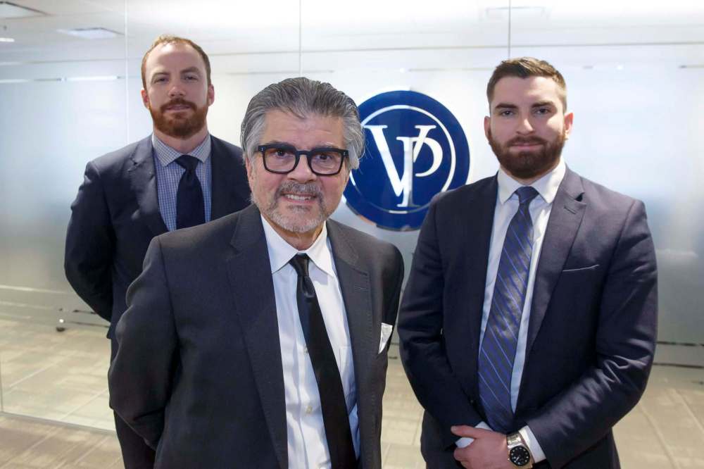 MIKE DEAL / WINNIPEG FREE PRESS
Larry Sarbit (centre) and his teammates Tim Skelly (left) and Tyler Baessler have joined Value Partners Investment, a Winnipeg mutual fund company with about $3 billion under management.