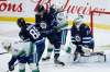 Winnipeg Jets' Luca Sbisa (5) blocks the shot with his toe against Vancouver Canucks' Elias Pettersson (40) during first period NHL action in Winnipeg, Friday, Nov. 8, 2019. THE CANADIAN PRESS/John Woods