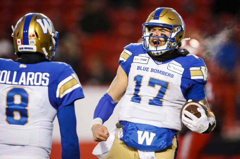 JEFF MCINTOSH / THE CANADIAN PRESS
Winnipeg Blue Bombers quarterback Chris Streveler, right, celebrates his touchdown with teammate Zach Collaros during CFL West Semifinal football action against the Calgary Stampeders, in Calgary, Sunday, Nov. 10, 2019.