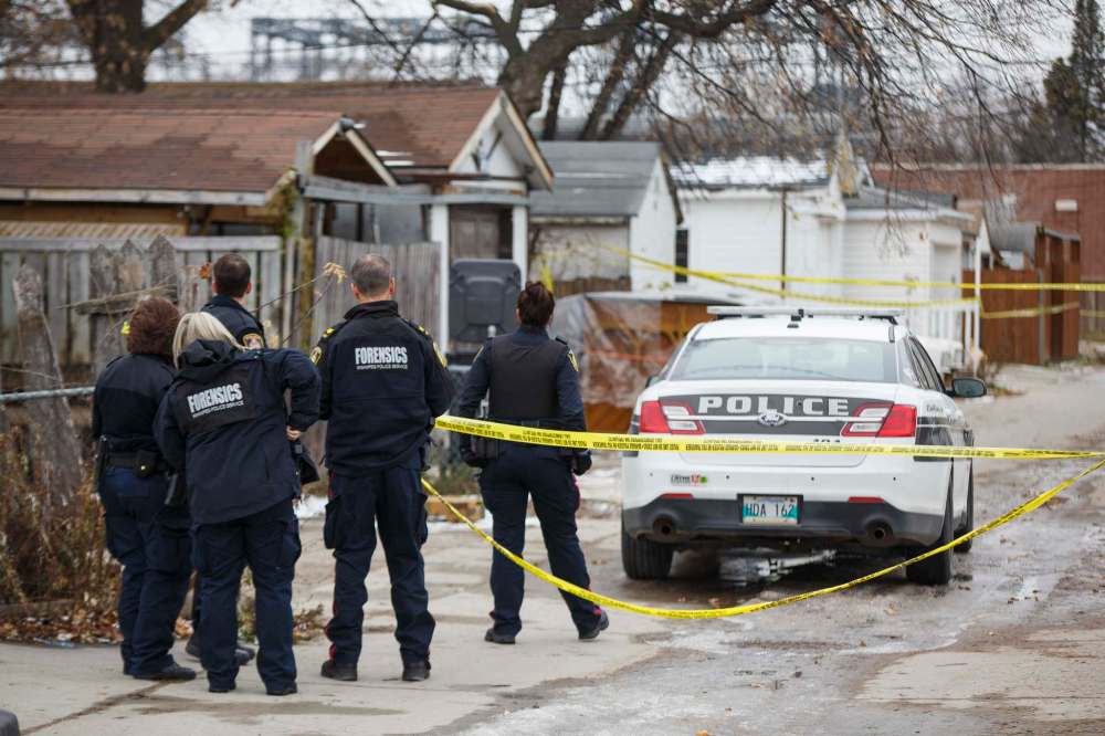 With 40 homicides so far this year, 74 officers have been temporary reassigned to bolster the homicide unit and increase the number of front-line officers responding to calls. (Mike Deal / Winnipeg Free Press files)