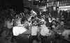 Wayne Glowacki / Winnipeg Free Press files
Excited Blue Bombers fans are held back by police officers at Winnipeg’s airport in 1988 after the team arrives back with the Grey Cup after beating the BC Lions in Ottawa.