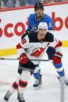 JOHN WOODS / WINNIPEG FREE PRESS FILES
Defenceman Luca Sbisa (behind the Devils’ Travis Zajac) has boosted the Jets’ penalty kill.