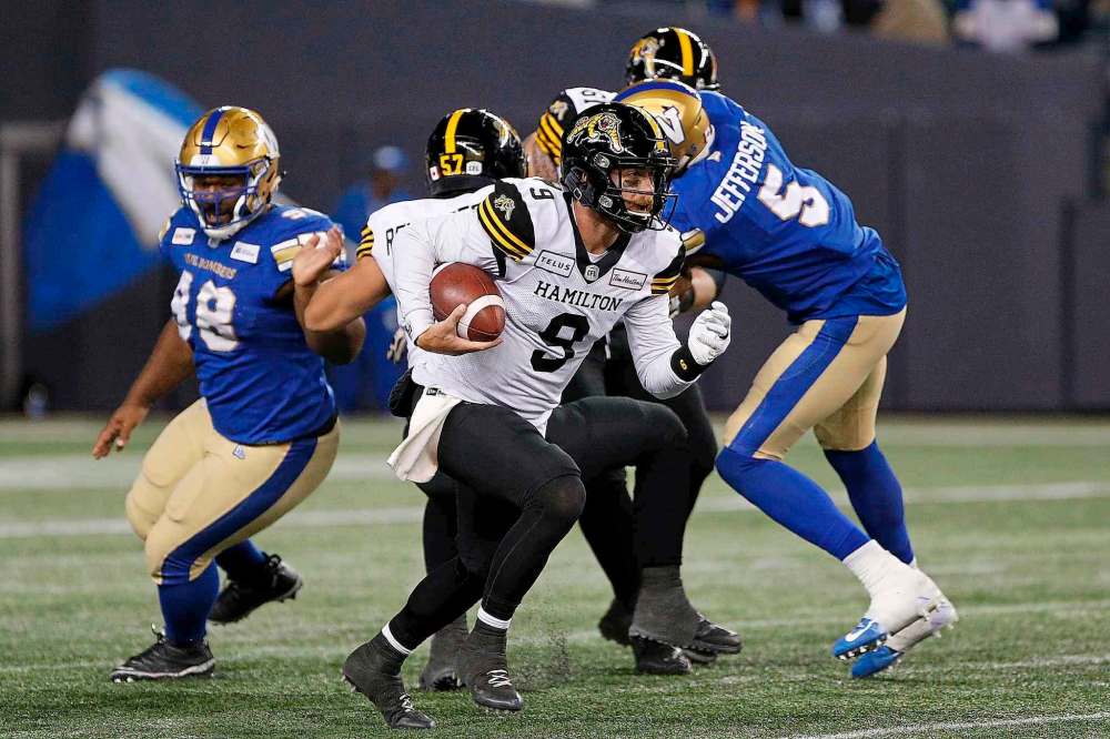 Hamilton Tiger-Cats quarterback Dane Evans (9) is heading into the biggest test of his young career. (John Woods/ The Canadian Press files)