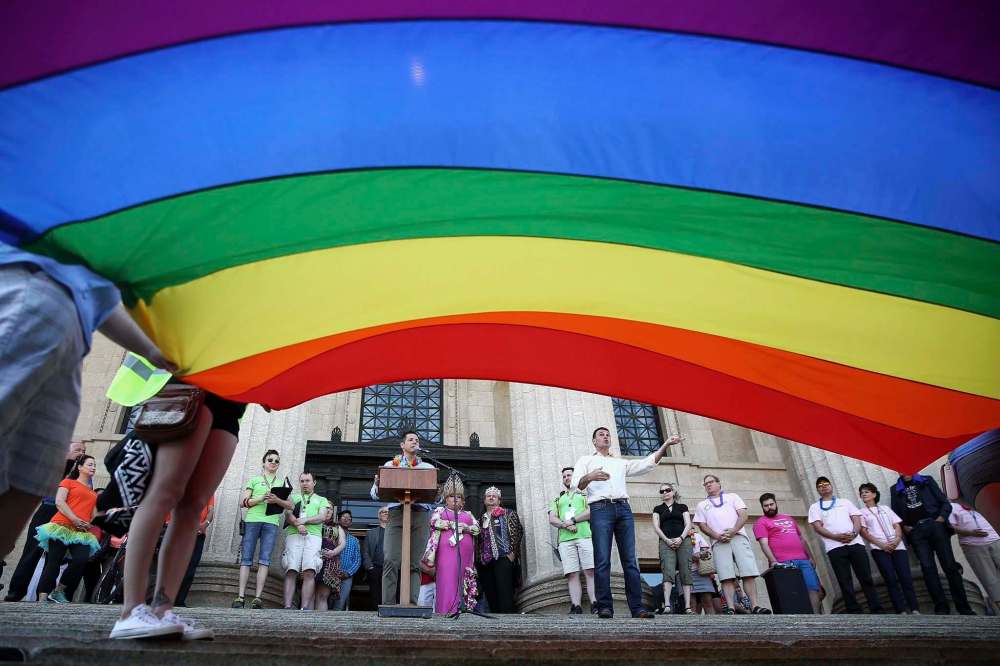 MIKE DEAL / FREE PRESS FILES
Winnipeg Mayor Brian Bowman speaks to the crowd gathered on the steps of the Manitoba Legislative Building before the Pride Parade last month.