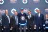 Nathan Denette / The Canadian Press
Patrik Laine, second overall pick, stands on stage with members of the Winnipeg Jets management team at the NHL draft in Buffalo, N.Y.