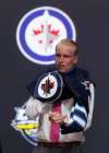 Timothy T. Ludwig / USA TODAY Sports files
Left-winger Patrik Laine pulls on a Jets jersey Friday in Buffalo after being selected No. 2 overall by Winnipeg.