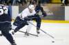 JOHN WOODS / WINNIPEG FREE PRESS
Team Blue Alec McCrea (95) tries to hold back Team White Erik Foley (63) during development camp at the Iceplex Tuesday.