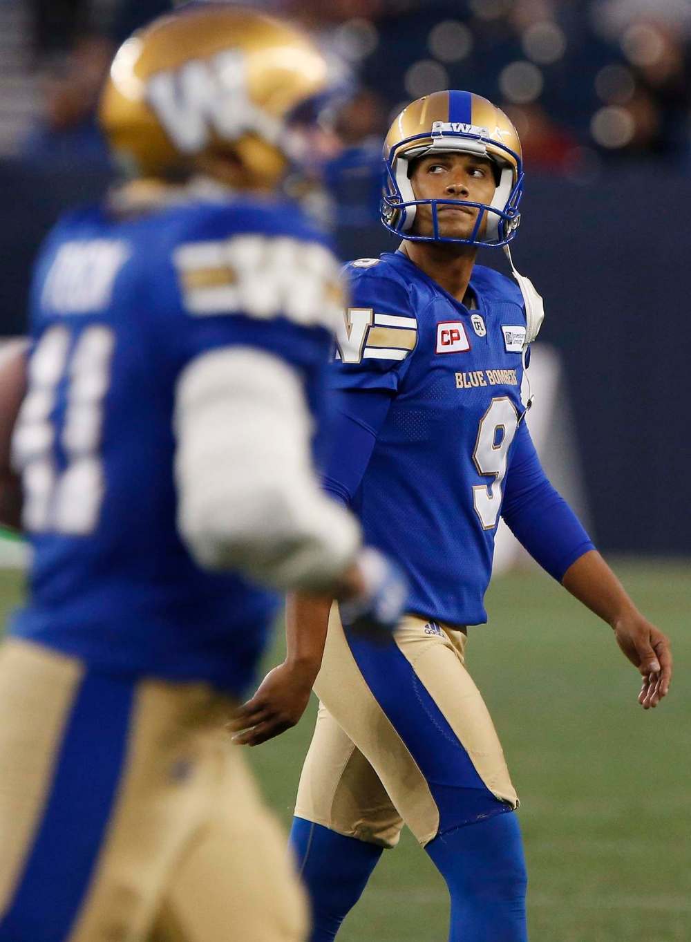 John Woods / The Canadian Press
Winnipeg Blue Bombers' kicker Justin Medlock (9) looks up at the replay of his missed field goal attempt during the second half of CFL action against the Edmonton Eskimos in Winnipeg Thursday.