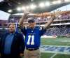RUTH BONNEVILLE / WINNIPEG FREE PRESS
All-star quarterback Ken Ploen, who started with The Winnipeg Blue Bombers in 1957, was inducted into the Ring of Honour with Bomber CEO Wade Miller during halftime of the Bombers' game against the Edmonton Eskimos at Investors Group Field Thursday night.