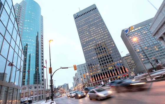 Phil Hossack / Winnipeg Free Press filesRush hour traffic moves through Portage and Main.