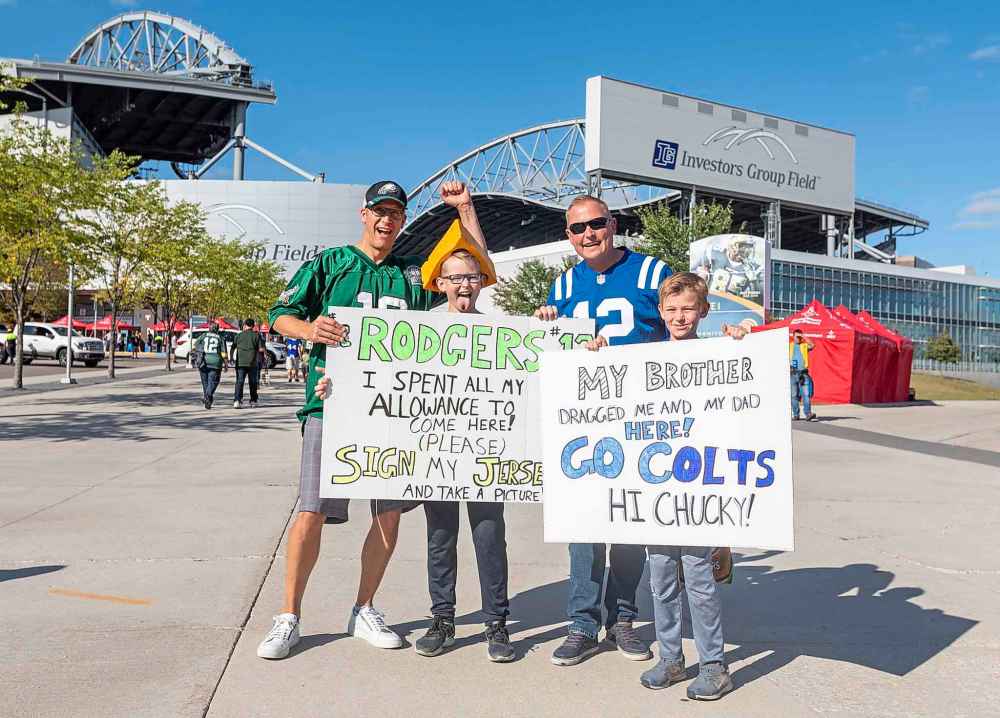 SASHA SEFTER / WINNIPEG FREE PRESS
(from left) Excited football fans Larry Millar from Winnipeg with friends Johnny (11) Darcy and Fletcher (9) Condon who drove to Winnipeg from Calgary for the NFL pre-season game.