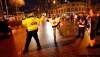 PHIL.HOSSACK@FREEPRESS.MB.CA
A Winnipeg Jets fan high-fives a city police officer directing traffic at Portage and Main Tuesday evening as the crowd emptied out of The Forks and gathered at the city's famous intersection.