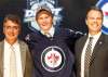 Keith Srakocic / The Associated Press
Jacob Trouba is all smiles alongside equally enthused head coach Claude Noel (left) and GM Kevin Cheveldayoff. The American defenceman was picked ninth overall by Winnipeg at Friday night's NHL entry draft in Pittsburgh.