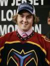 Tobin Grimshaw / The Canadian Press Archives
Alex Bourret of Drummondville, Que. tries on his Atlanta Thrashers jersey during the first round draft pick at the NHL entry draft in Ottawa in 2005. His 16th-overall selection in the first round was one of only two times the Thrashers/Jets organization picked later than 13th in the draft. Since being drafted, Bourret has yet to crack an NHL lineup.