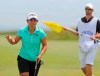 Clariss Guce holds up the ball after finishing the first round of the ShopRite LPGA Classic golf tournament in Galloway, N.J., Friday, June 7, 2019. (Craig Matthews/The Press of Atlantic City via AP)