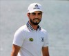 Abraham Ancer smiles after finishing the fourth hole during the Northern Trust golf tournament at Liberty National Golf Course, Saturday, Aug. 10, 2019 in Jersey City, N.J. (Chris Pedota/The Record via AP)