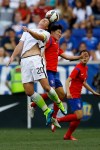 United States forward Abby Wambach, left, and South Korea defender Kim Sooyun go up for the ball during the first half of an international friendly soccer match, Saturday, May 30, 2015, in Harrison, N.J. (AP Photo/Julio Cortez)