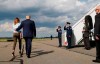 President Donald Trump, with first lady Melania Trump, walks back to Airs Force One after speaking to the media before boarding Air Force One in Morristown, N.J., Sunday, Aug. 4, 2019. (AP Photo/Jacquelyn Martin)