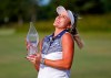 Lexi Thompson celebrates with the trophy after wining the LPGA Classic golf tournament, Sunday, June 9, 2019, in Galloway, NJ. (AP Photo/Noah K. Murray)