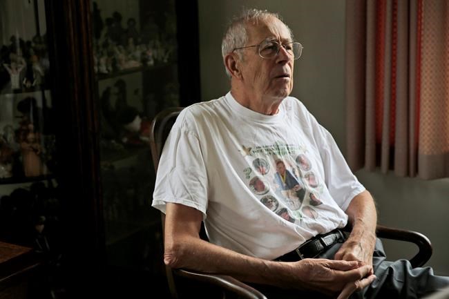 James Peebles talks to a reporter at his home in Princeton, N.J., after being awarded this year's Nobel Prize in Physics, Tuesday, Oct. 8, 2019. Peebles, of Princeton University, shares the prize with Swiss scientists Michel Mayor and Didier Queloz for their work in understanding how the universe has evolved from the Big Bang and the blockbuster discovery of the first known planet outside our solar system. (AP Photo/Seth Wenig)