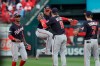 Washington Nationals' Juan Soto and Brian Dozier celebrate after Game 2 of the baseball National League Championship Series against the St. Louis Cardinals Saturday, Oct. 12, 2019, in St. Louis. The Nationals won 3-1 to take a 2-0 lead in the series. (AP Photo/Mark Humphrey)