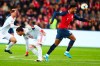 Spain's Sergio Ramos, left, fights for the ball against Norway's Joshua King, right, during the UEFA Euro 2020 qualifying Group F soccer match between Norway and Spain at Ullevaal Stadium in Oslo, Norway on Saturday, Oct. 12, 2019. (Tore Meek/NTB scanpix via AP)