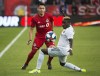 Toronto FC midfielder Marco Delgado (8) pass the ball past D.C. United defender Akeem Ward (30) during first half MLS soccer action in Toronto on Wednesday, May 15, 2019. THE CANADIAN PRESS/Nathan Denette