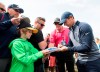 Rory McIlroy signs autographs for fan during the Pro-Am ahead of the 2019 Canadian Open in Hamilton, Ont., on Wednesday, June 5, 2019. THE CANADIAN PRESS/Nathan Denette