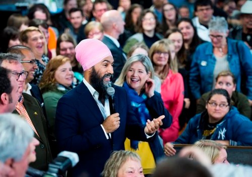 NDP leader Jagmeet Singh, left, and provincial NDP leader Andrea Horwath, right, speak to supporters at the Blue Star diner during a campaign stop in Welland Ont., on Thursday, October 17, 2019. THE CANADIAN PRESS/Nathan Denette