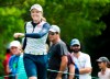 Canadian Brooke Henderson laughs with fans as she makes her way to the eighth tee box during a practice round ahead of the CP Women's Open in Aurora, Ont., on Tuesday, August 20, 2019. THE CANADIAN PRESS/Nathan Denette