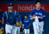 Toronto Blue Jays starting pitcher Marcus Stroman, centre, walks in with his starting rotation and catcher before playing American League MLB baseball against the Tampa Bay Rays, in Toronto on Sunday, July 28, 2019. THE CANADIAN PRESS/Nathan Denette