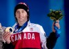 Canadian Mark McMorris receives his bronze medal for snowboard slopestyle at the medal ceremonies during the 2014 Sochi Winter Olympics in Sochi, Russia on Saturday, February 8, 2014. THE CANADIAN PRESS/Nathan Denette