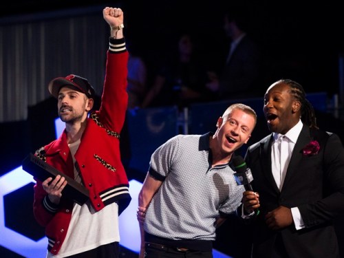 Ryan Lewis left, and Macklemore, centre, win for International Duo/Group of the Year during the Much Music Video Awards in Toronto on Sunday, June 19, 2016. THE CANADIAN PRESS/Chris Young
