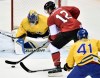 Canada forward Patrick Marleau looks to shoot against Sweden goalie Henrik Lundqvist during third period action in the gold medal game at the 2014 Sochi Winter Olympics in Sochi, Russsia, on Sunday, February 23, 2014. THE CANADIAN PRESS/Nathan Denette