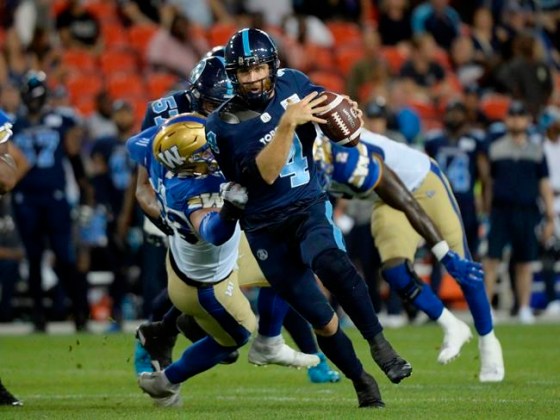 Toronto Argonauts quarterback McLeod Bethel-Thompson (4) runs for the first down against the Winnipeg Blue Bombers during second half CFL football action in Toronto on Thursday, August 1, 2019. THE CANADIAN PRESS/Nathan Denette