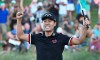 Kevin Na celebrates after winning the Shriners Hospitals for Children Open golf tournament on the second playoff hole Sunday, Oct. 6, 2019, in Las Vegas. (AP Photo/David Becker)
