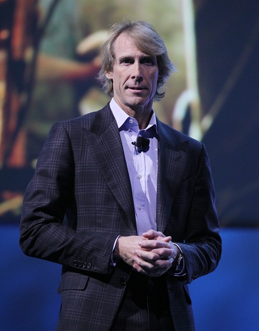 Director Michael Bay appears at a Samsung news conference at the International Consumer Electronics Show, Monday, Jan. 6, 2014, in Las Vegas. (AP Photo/Isaac Brekken)