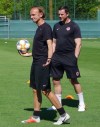 Canada women's soccer team coach Kenneth Heiner-Moller (left) and goalkeeping coach Simon Eaddy attend a team practice in Laverune, France on Saturday, June 8, 2019. Canada opens play on Monday against Cameroon. THE CANADIAN PRESS/Neil Davidson