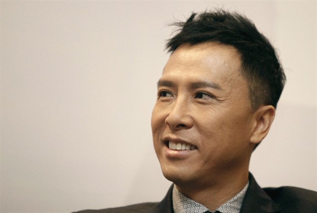 FILE - In this Oct. 10, 2013 file photo, Hong Kong actor Donnie Yen smiles during a press conference in Kuala Lumpur, Malaysia. The action star plays the title role in the upcoming fantasy epic “The Monkey King,” which will be released in China and Hong Kong on Jan. 30 before the Lunar New Year holidays. (AP Photo/Lai Seng Sin, File)