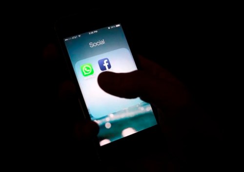 FILE - This Feb. 19, 2014, file photo shows the Facebook app icon on an iPhone in New York. Panic over what children are picking up over the Internet sweep social media on a regular basis. In the most recent, children are purportedly encouraged to complete harmful tasks. Though the so-called Momo challenge is believed to be a hoax, other ‚Äúchallenges‚Äù and trends should cause concern. (AP Photo/Karly Domb Sadof, File)