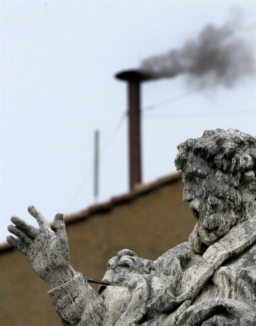 FILE - In this April 19, 2005 file photo, black smoke billows from the chimney atop the Sistine Chapel at the Vatican, indicating that the cardinals gathered in the Conclave for the second consecutive day have not yet chosen the new pontiff. (AP Photo/Diether Endlicher, File)