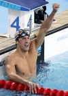 FILE - In this Aug. 14, 2004 file photo, Michael Phelps of the U.S. reacts after winning the 400m individual medley at the Olympic Games Saturday, Aug. 14, 2004 in Athens. Phelps retires with twice as many golds as any other Olympian, and his total of 22 medals is easily the best mark. (AP Photo/Rusty Kennedy, File)