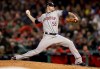 FILE - In this Oct. 13, 2018 file photo, Houston Astros pitcher Ryan Pressly throws against the Boston Red Sox during the seventh inning in Game 1 of a baseball American League Championship Series in Boston. Pressly and the Astros have agreed to a $20.4 million, three-year contract, a deal that adds $17.5 million over an additional two seasons. The 30-year-old agreed in January 2019 to a $2.9 million, one-year contract that avoided salary arbitration. The deal announced Wednesday, March 20 keeps that salary and adds $8.75 million in each of the following two seasons. (AP Photo/Charles Krupa)