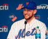 FILE - In this Wednesday, Jan. 16, 2019 file photo, New York Mets All-Star infielder Jed Lowrie smiles as he talks to the media during a press conference introducing him, after he signed with the team in New York. The Mets have activated infielder Jed Lowrie from the 60-day injured list for the first time this season, Saturday, Sept. 7, 2019. (AP Photo/Kathy Willens, File)