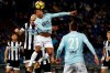 FILE - In this Jan. 24, 2018, file photo, Lazio's Nani, top, and Udinese's Bram Nuytinck go for the ball during a soccer match in Rome, Italy. Former Manchester United winger Nani has become the latest 30-plus star to join Major League Soccer after a career in Europe, agreeing to a three-year contract with Orlando City. The team said Monday, Feb. 18, 2019, that Nani was given a free transfer from Portugal's Sporting Lisbon and will be a designated player who counts only partially against the team's salary cap. (AP Photo/Gregorio Borgia, File)
