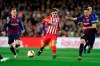 FILE - In this April 6, 2019, file photo, Atletico forward Antoine Griezmann, center, vies for the ball with Barcelona midfielder Arthur, left, and Barcelona defender Clement Lenglet, right, during a Spanish La Liga soccer match in Barcelona, Spain. Atletico Madrid will be the opponent for the Major League Soccer All-Star game this summer in Orlando. The 10-time La Liga champions are the second team from the league to play the domestic All-Stars, joining Real Madrid, the opponents in the 2017 game in Chicago. (AP Photo/Manu Fernandez, File)