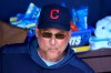 FILE - In this Monday, March 4, 2019, file photo, Cleveland Indians manager Terry Francona sits in the dugout before a spring training baseball game against the San Diego Padres in Peoria, Ariz. The Indians have their sights set on their first World Series title since 1948, but to get it they‚Äôll have to replenish some power lost during the offseason and get by league powers Houston, New York and Boston. (AP Photo/Ross D. Franklin, File)