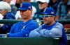 FILE - In this Sept. 10, 2017, file photo, Seattle Mariners manager Scott Servais, left, and hitting coach Edgar Martinez stand at the rail of the dugout during the team's baseball game against the Los Angeles Angels in Seattle. Servais had never crossed paths with Martinez until being hired as Seattle’s manager in 2016. Martinez was the hitting coach under the previous regime and remained on staff. (AP Photo/Ted S. Warren, File)