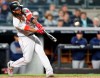 FILE - In this May 9, 2018, file photo, Boston Red Sox's Hanley Ramirez hits a seventh-inning, two-run home run off New York Yankees relief pitcher Chad Green in a baseball game in New York. Free agent slugger Hanley Ramirez has signed with the Indians, who hope he can give them some power. The 35-year-old Ramirez passed his physical and reported to training camp on Tuesday, Feb. 26, 2019. (AP Photo/Kathy Willens, File)