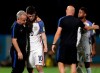 FILE - In this Oct. 10, 2017, file photo, United States' Christian Pulisic, (10) is comforted by assistant coach Dave Sarachan after losing 2-1 against Trinidad and Tobago during a 2018 World Cup qualifying soccer match  in Couva, Trinidad. It’s been nearly two years since U.S. men’s soccer team was dealt a devastating kick in the gut, an improbable loss that dropped an entire program to its knees. On Saturday, June 22, 2019, the Americans can get some payback. (AP Photo/Rebecca Blackwell, File)